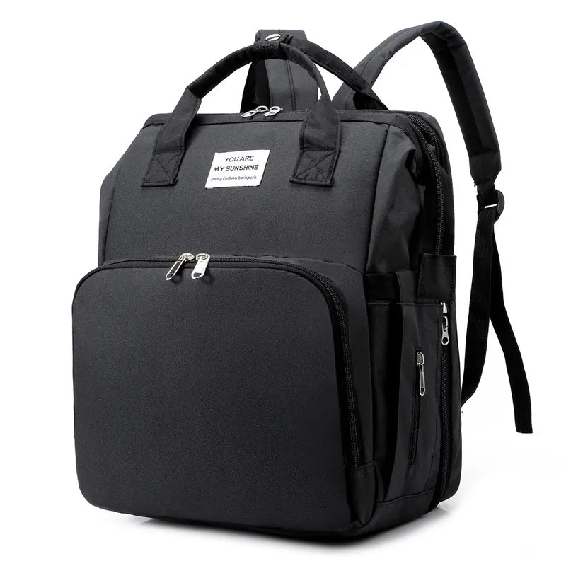 Foldable Baby Crib with Changing Pad Diaper Bag Backpack USB Interface Babies Bags